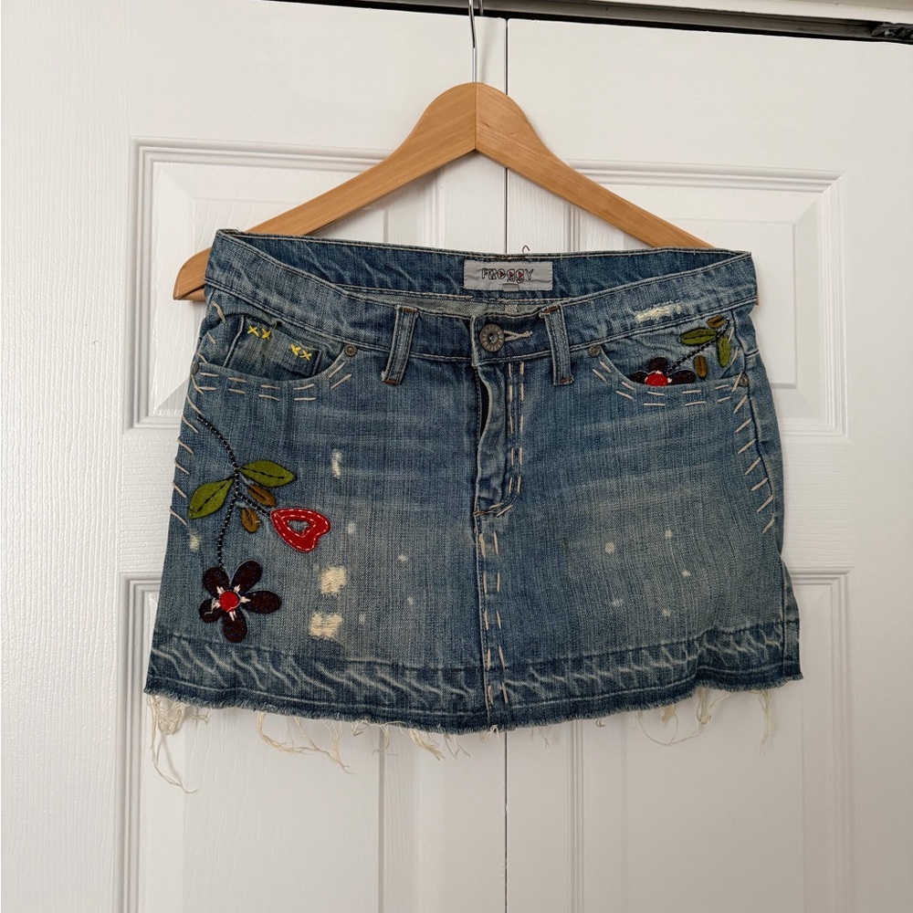 Trendy Blue Denim Mini Skirt with Floral Embroidery
